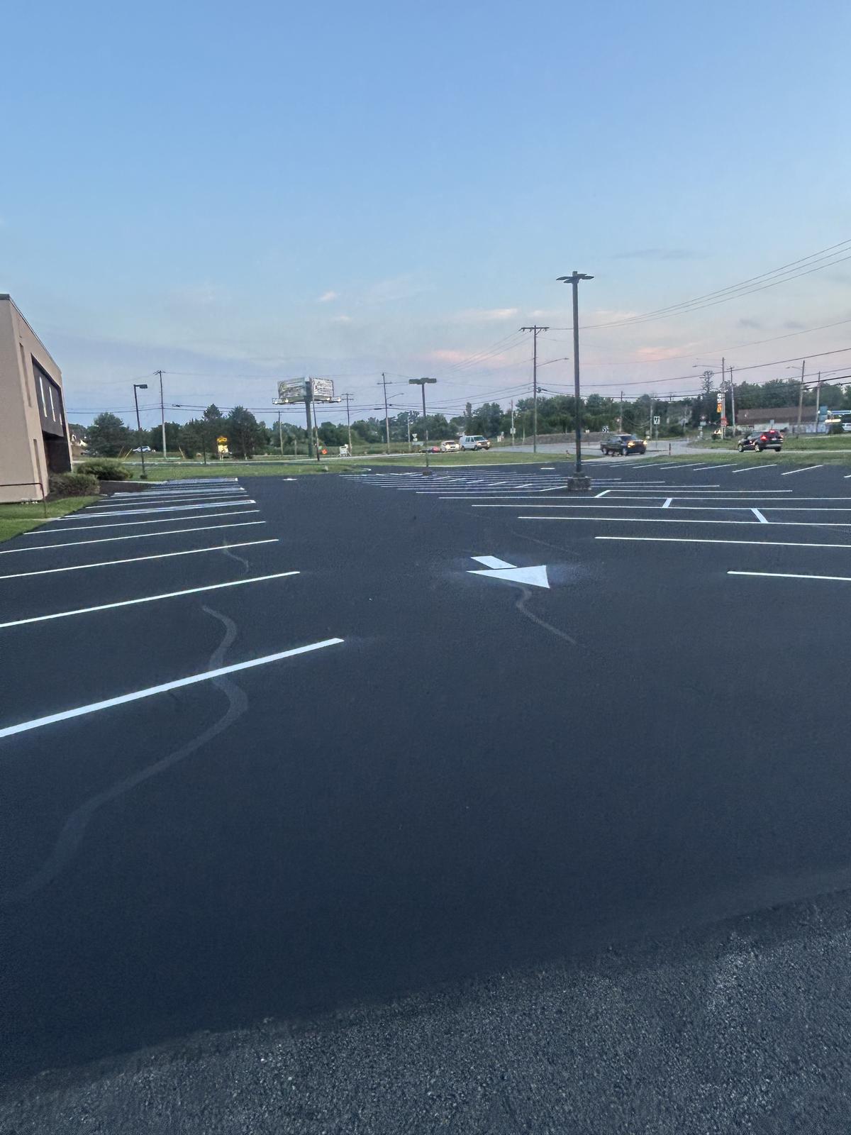 Commercial parking lot after sealcoat and striping